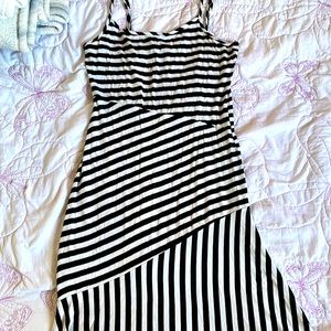 A white and black strip maxi dress. lines go horizontal and vertical.
